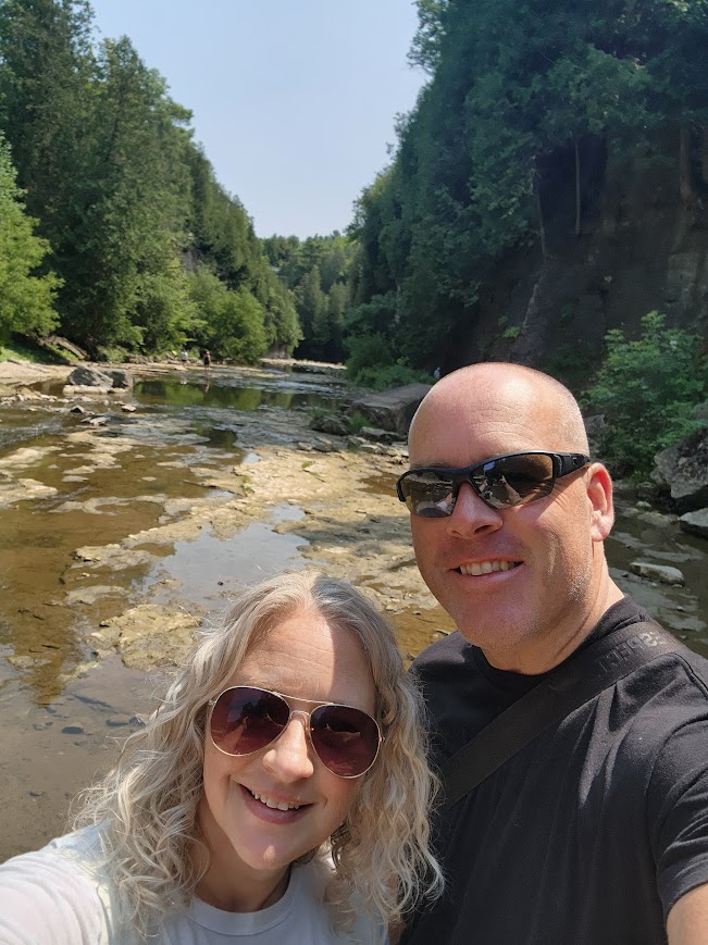 Chris and his wife at the river